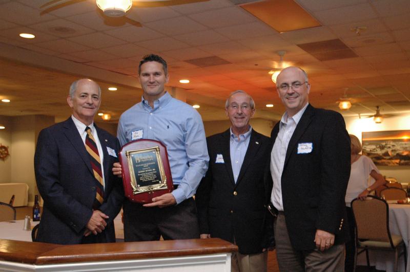 Dr. Rob Myers was presented with Beebe Healthcare’s Standards of Excellence Award. Pictured here, left to right, are: Jeffrey M. Fried, President and CEO of Beebe Healthcare; Dr. Rob Myers; David A. Herbert, Vice Chair of the Beebe Board of Directors; and Dr. Jeffrey Hawtof, Vice President of Medical Operations and Informatics Dr Myers receives Excellence Award